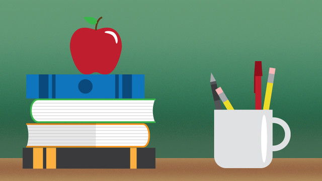 Apple on stack of bucks next to coffee mug of pencils and pens