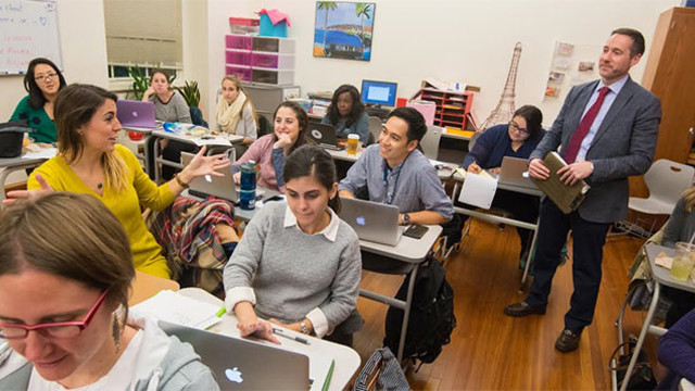 classroom of students on their laptops